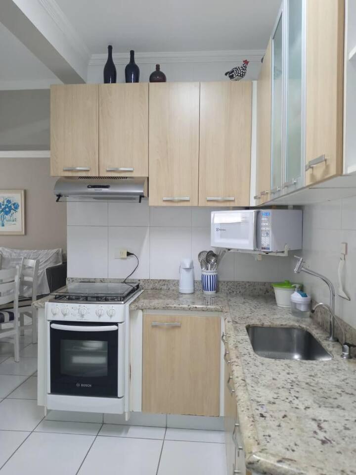 Apartamento completo na calçada da praia Apartment Guarujá Exterior foto